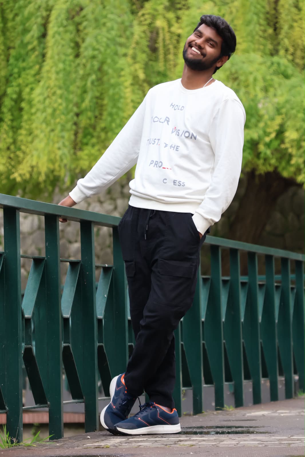 Bridge portrait, laughing in front of willow greens
