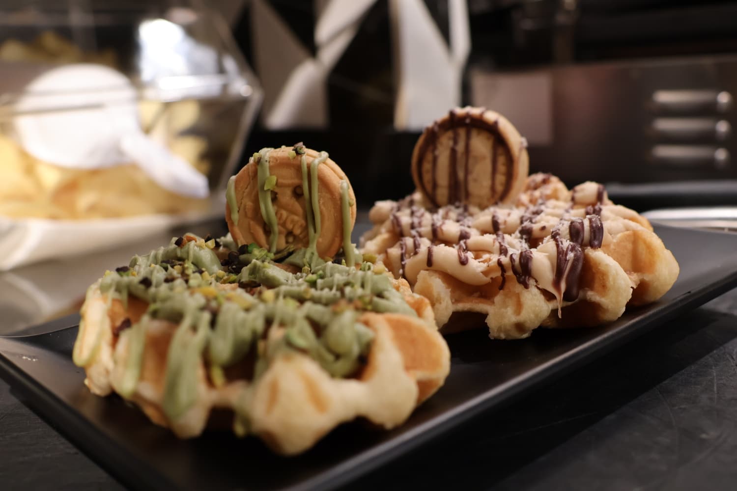 Pistachio and chocolate liège waffles plated