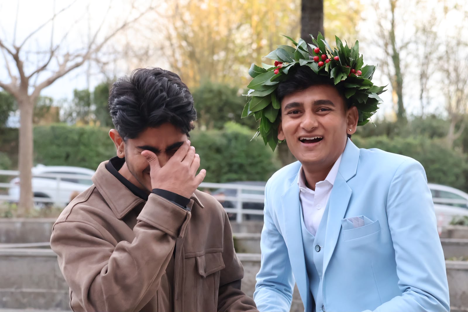 Laughter shared between friends, graduation day